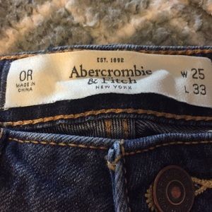 A pair of Abercrombie and Fitch distressed jeans 0